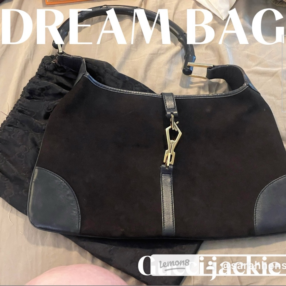 Gucci “Jackie” Vintage Bag.  Brown suede, bamboo handle, and rare crab clasp.